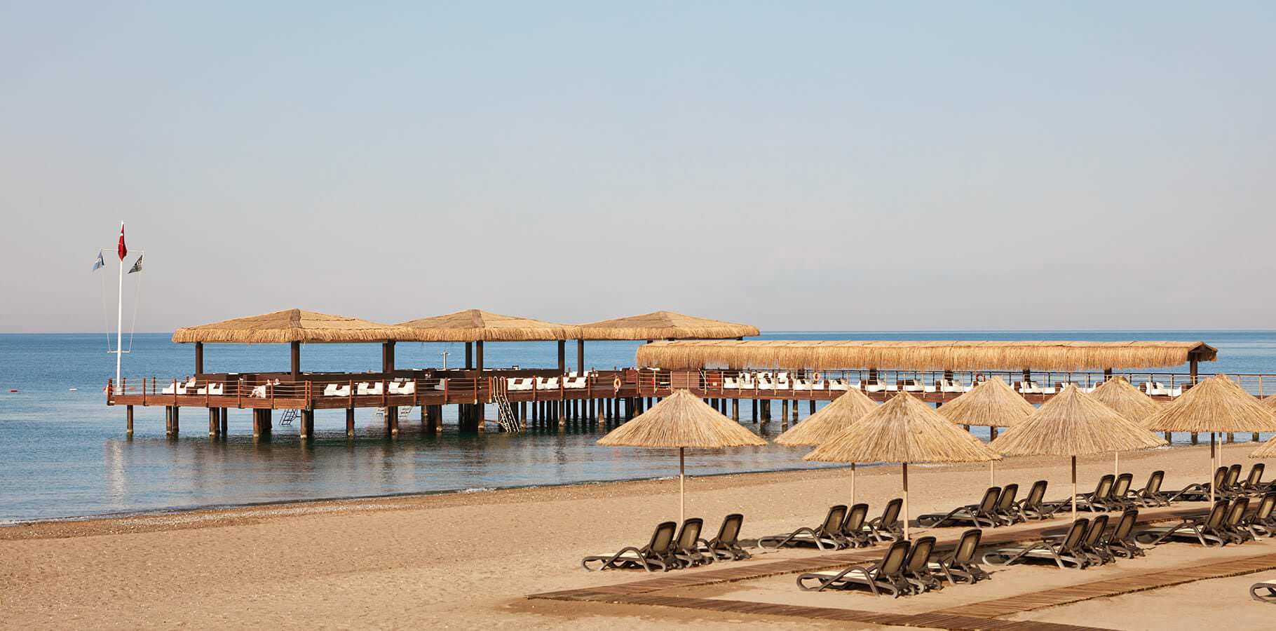 Gloria Serenity Resort Beach Sunbeds and Pier